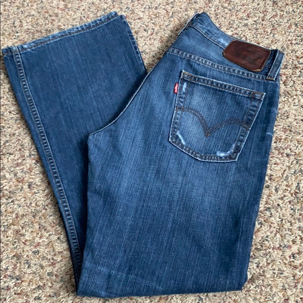Levi’s 527 Boot Cut Distressed Jeans